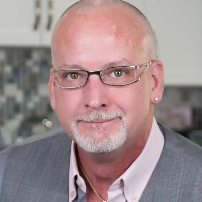 Dr. John Streukens